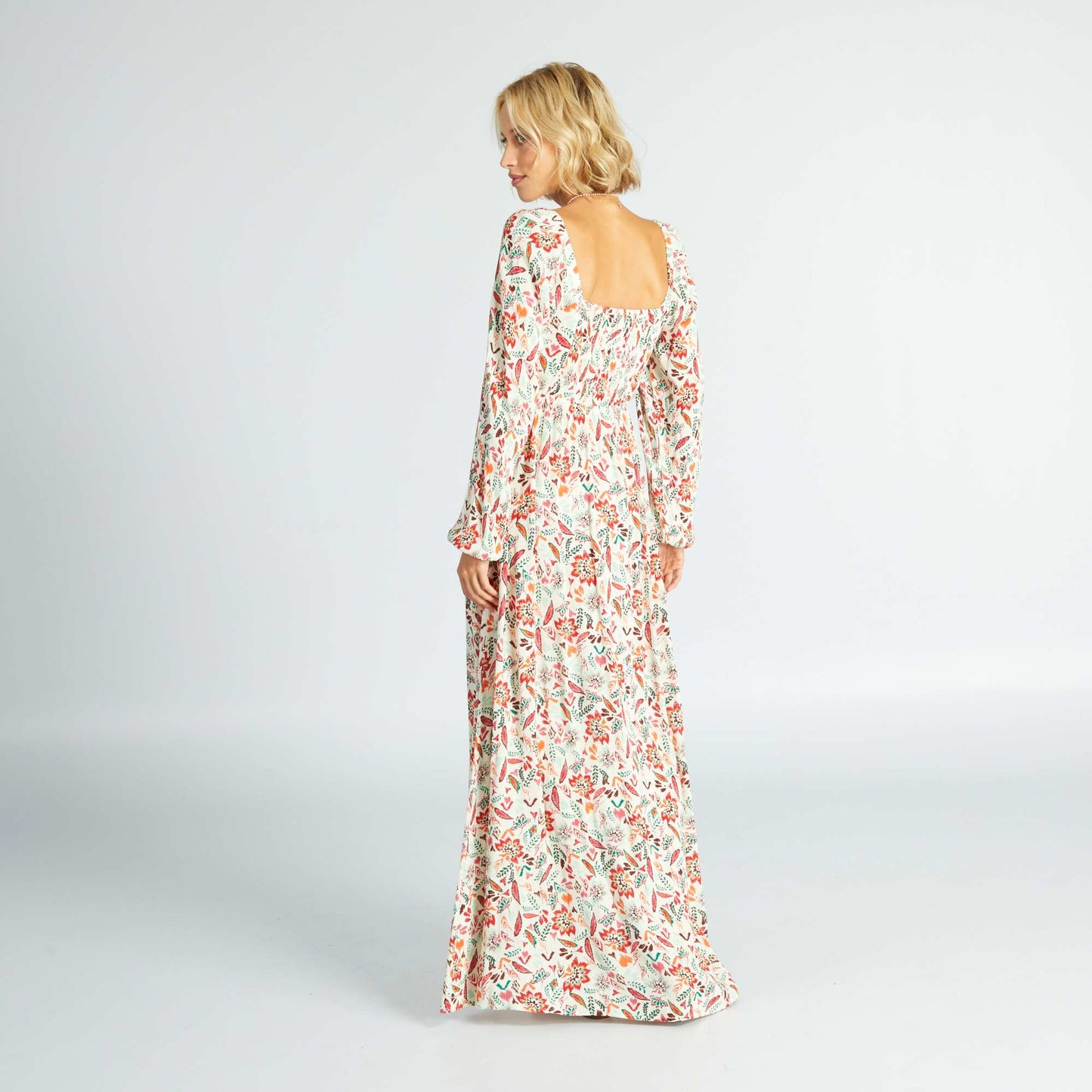Long printed dress with cut-out at the chest BEIGE
